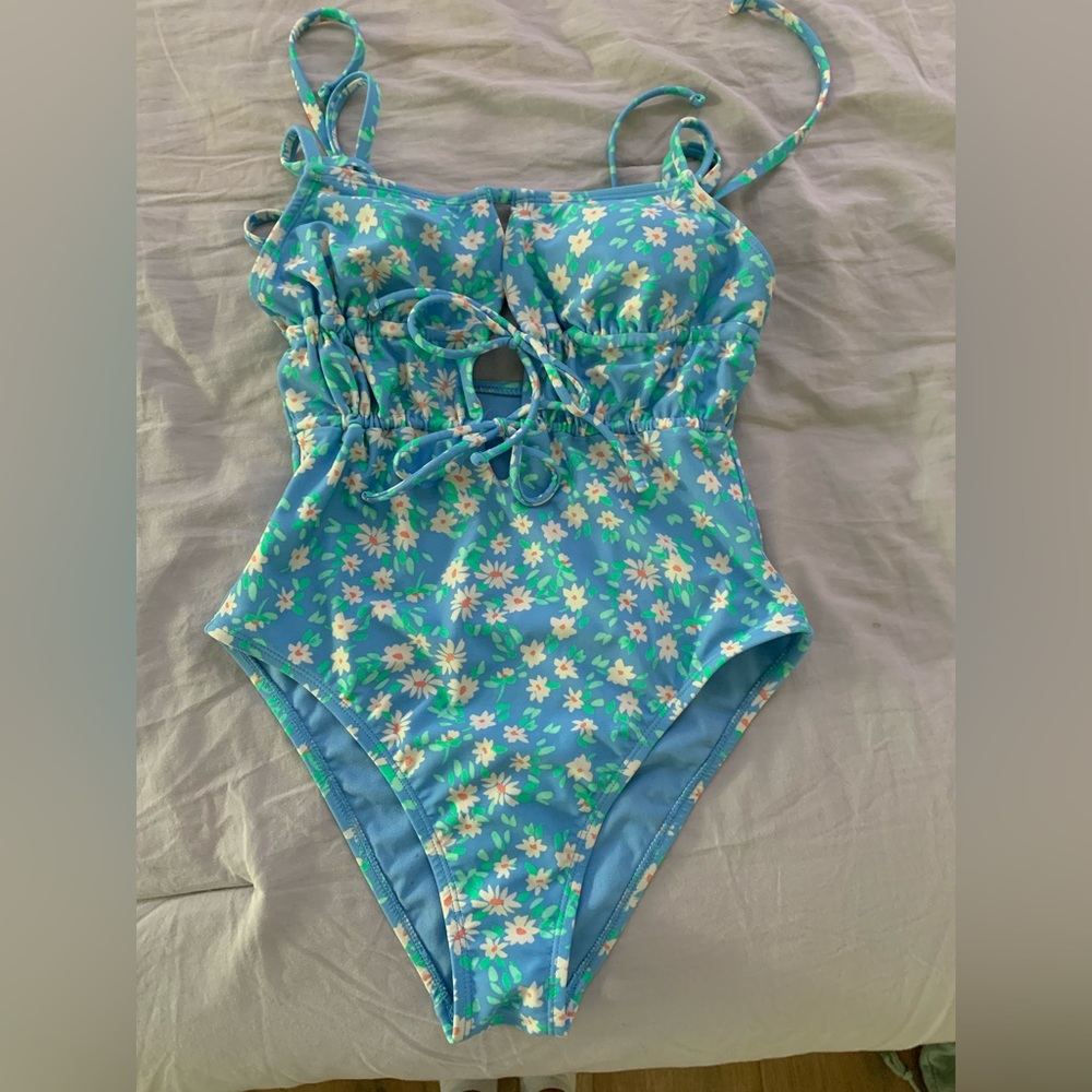 Blue one piece swimsuit with daisies from target